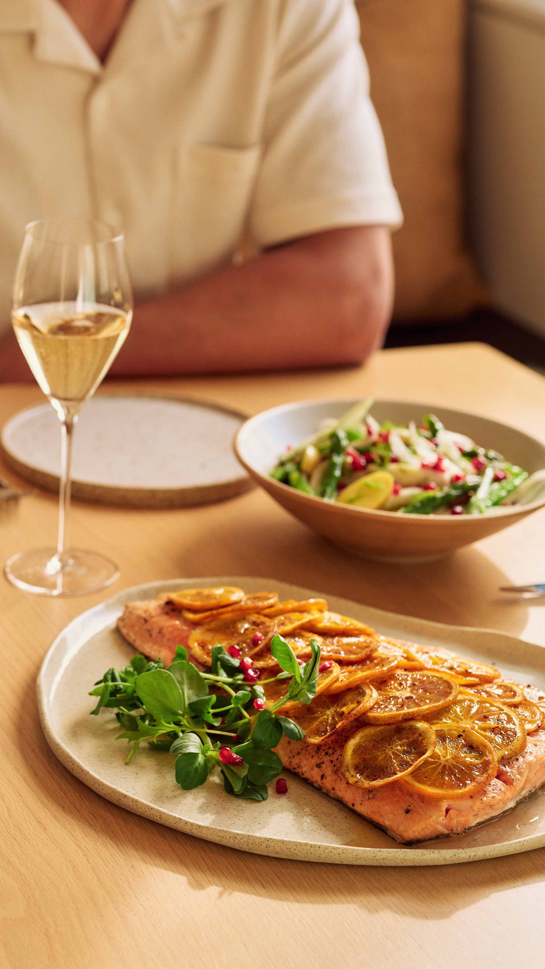 table-with-baked-salmon-salad-and-pelorus